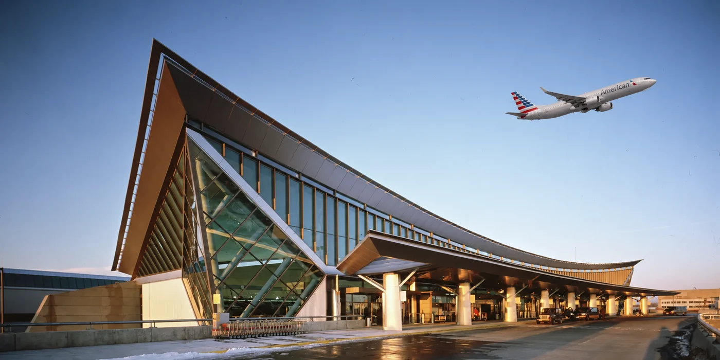 American Airlines jet above the Buffalo Niagara International Airport terminal
